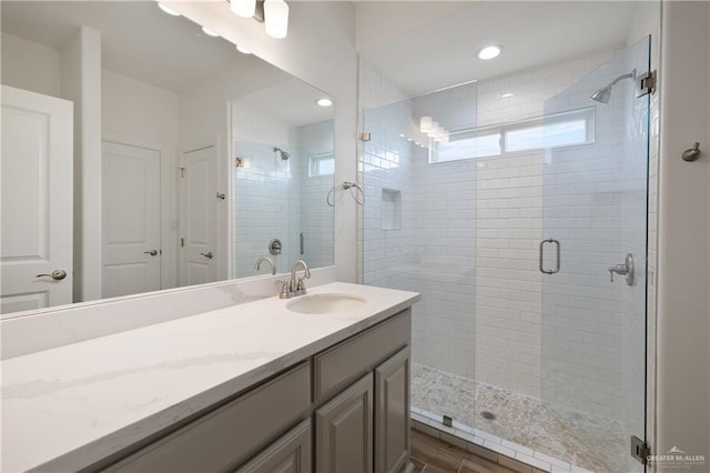 2206 Seagull Ln, Mission, TX 78572 - bathroom with vanity, recessed lighting, and a shower stall