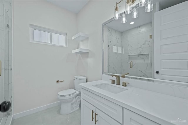 bathroom with vanity, toilet, and walk in shower