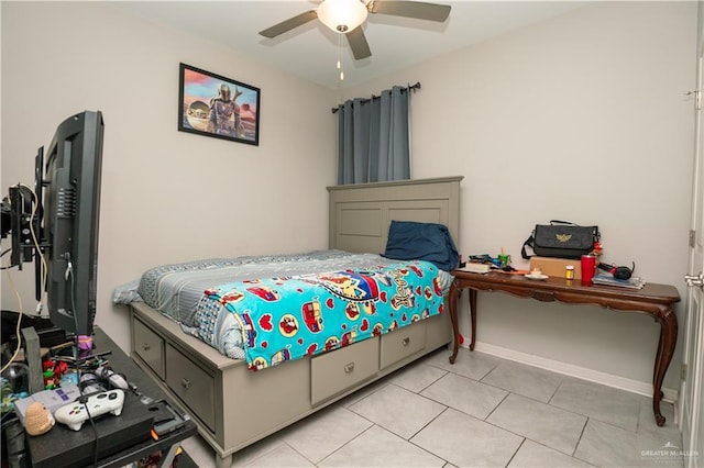 bedroom featuring light tile patterned floors and a ceiling fan