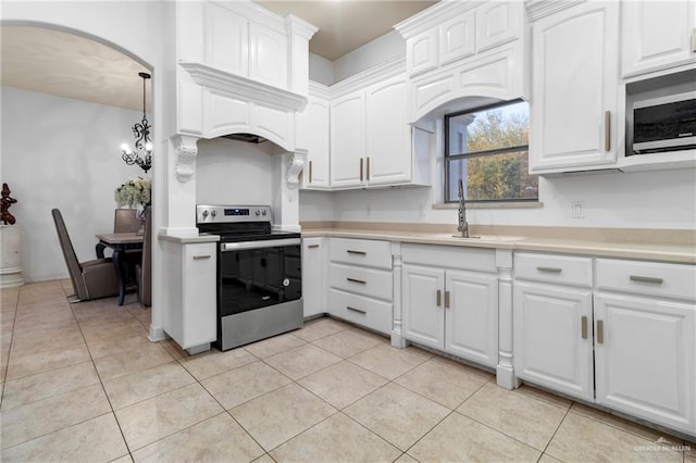 kitchen featuring white cabinetry, sink, stainless steel electric range, and light tile patterned flooring