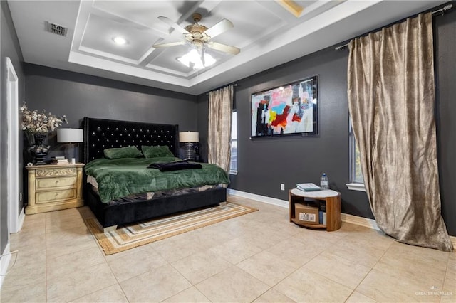 bedroom with ceiling fan, coffered ceiling, and light tile patterned floors