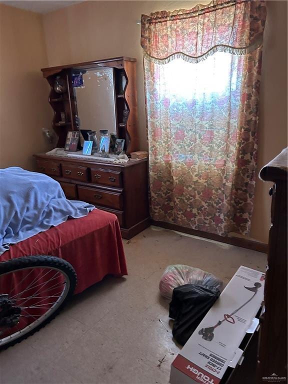 403 E San Benito St E Unit A, Rio Grande City, TX 78582 - bedroom featuring tile patterned floors