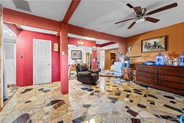 34349 Fm 732nd Hwy, San Benito, TX 78586 - bedroom featuring stone tile floors, beamed ceiling, and visible vents
