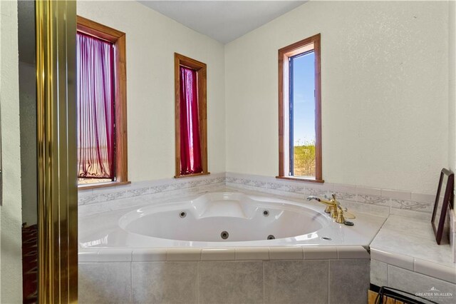 34349 Fm 732nd Hwy, San Benito, TX 78586 - bathroom featuring a tub with jets