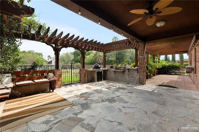 109 Palm Valley Cir, Harlingen, TX 78552 - view of patio / terrace featuring fence, area for grilling, a ceiling fan, and a pergola