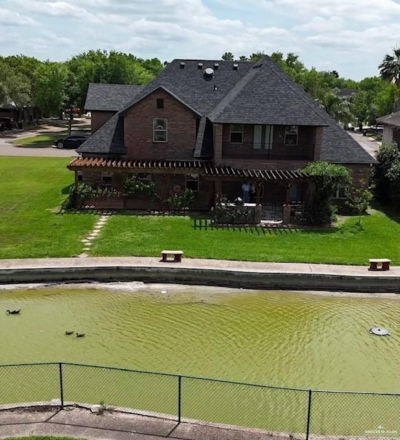 109 Palm Valley Cir, Harlingen, TX 78552 - exterior space featuring fence and a yard