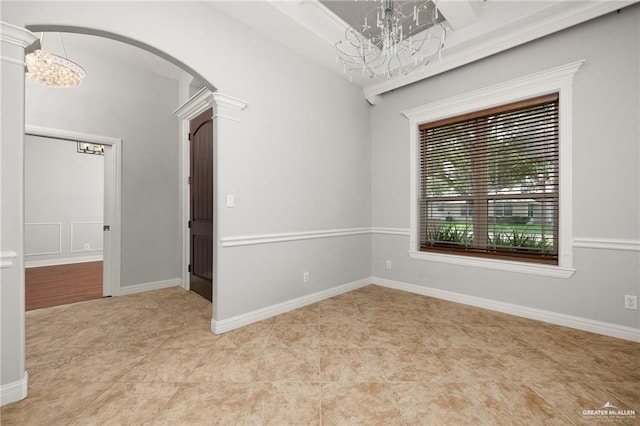 109 Palm Valley Cir, Harlingen, TX 78552 - empty room featuring a chandelier, arched walkways, and tile patterned flooring