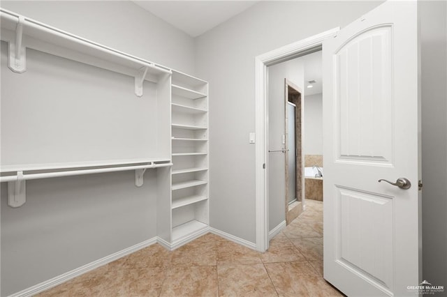 109 Palm Valley Cir, Harlingen, TX 78552 - spacious closet with light tile patterned floors