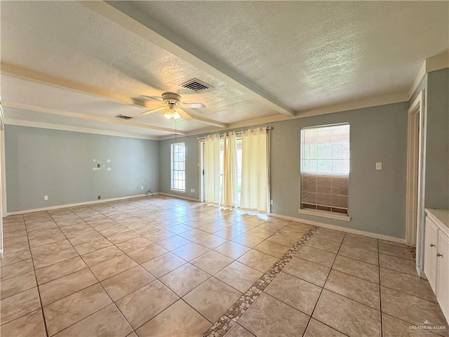 unfurnished room featuring light tile patterned floors, a textured ceiling, and ceiling fan