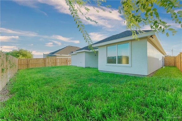 exterior space with a lawn