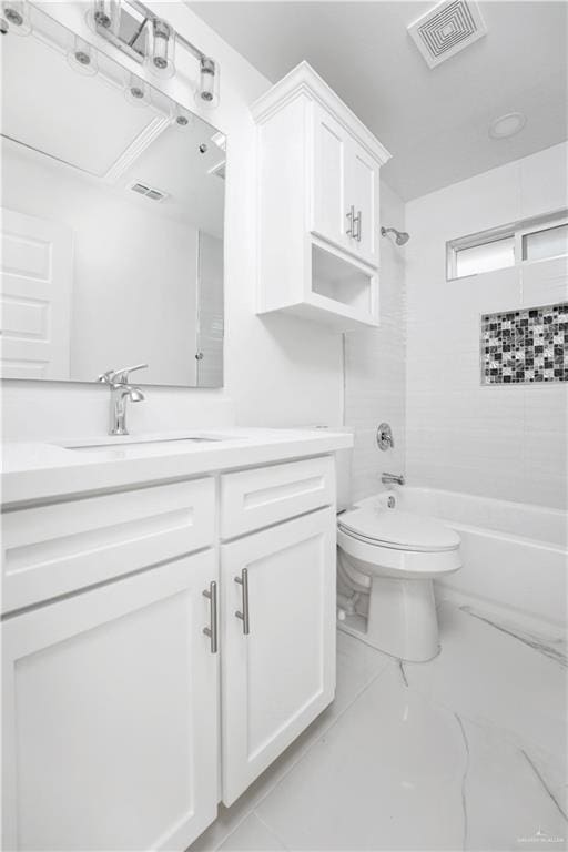 full bathroom with tiled shower / bath combo, vanity, and toilet