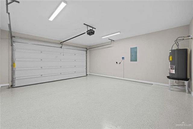 garage featuring a garage door opener, electric panel, and water heater