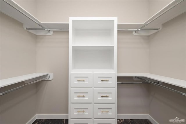 9510 N 71st Ln, Mcallen, TX 78573 - walk in closet featuring dark marble finish flooring