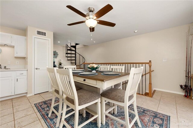 123 Windward Dr, Port Isabel, TX 78578 - dining space with a ceiling fan, stairs, and recessed lighting