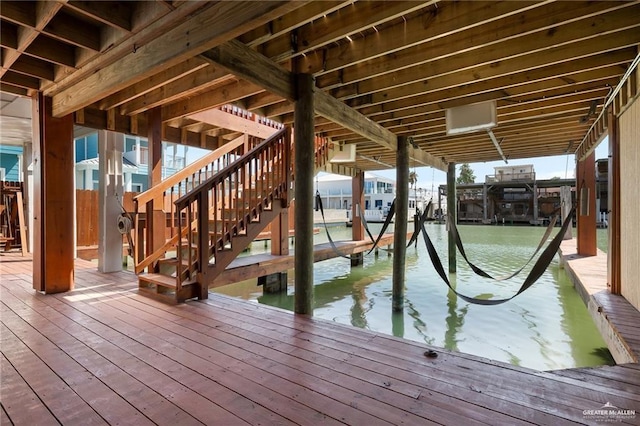 123 Windward Dr, Port Isabel, TX 78578 - dock featuring boat lift, stairs, and a water view