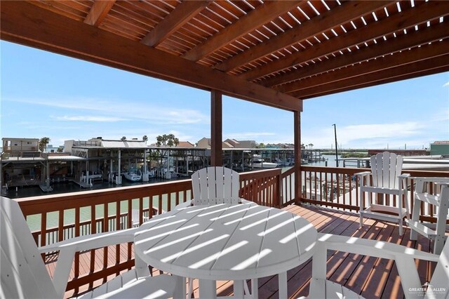 123 Windward Dr, Port Isabel, TX 78578 - wooden terrace featuring a water view