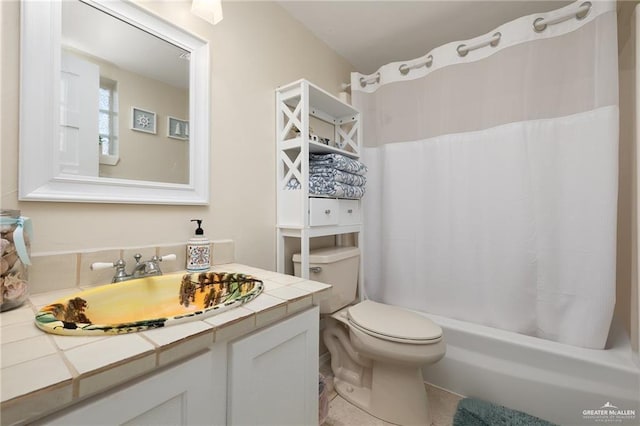 123 Windward Dr, Port Isabel, TX 78578 - full bath featuring vanity, shower / tub combo, and tile patterned flooring