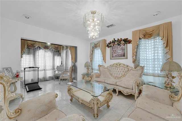 613 E Moore Rd, San Juan, TX 78589 - tiled living room featuring a chandelier