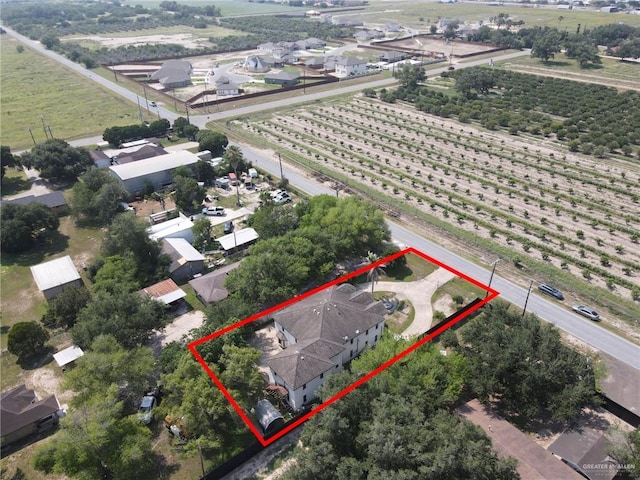 613 E Moore Rd, San Juan, TX 78589 - view of rural area with farmland and property parcel outlined
