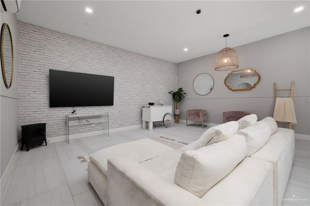 tiled living area with baseboards, a wall unit AC, a wood stove, and recessed lighting