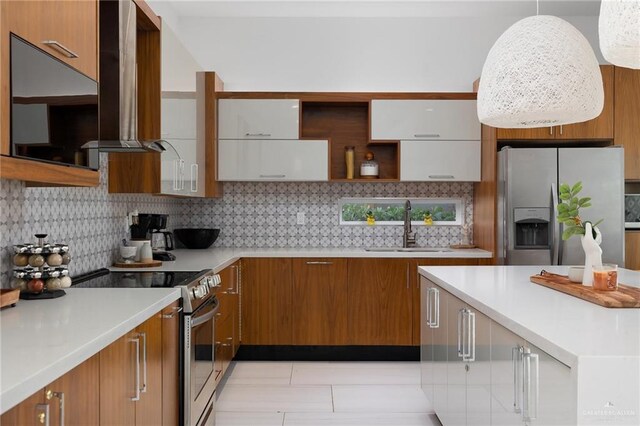 kitchen featuring brown cabinetry, island exhaust hood, open shelves, a sink, and stainless steel appliances