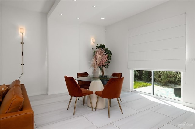 dining space with recessed lighting
