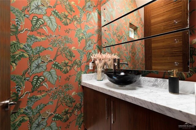 5513 N 35th St, Mcallen, TX 78504 - bathroom featuring vanity and wallpapered walls