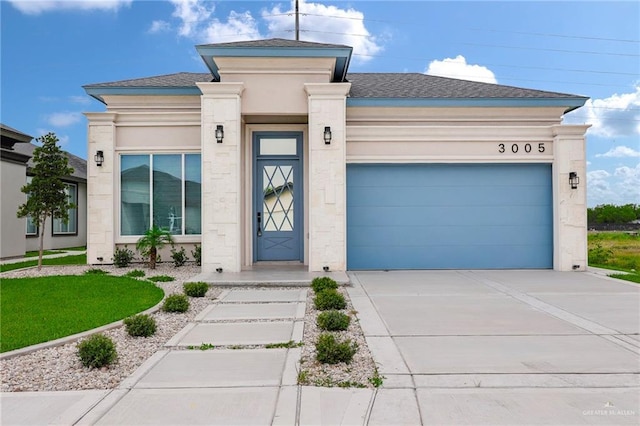 3005 N Alyna Ave, Edinburg, TX 78541 - view of front of home with a garage, driveway, roof with shingles, and stucco siding