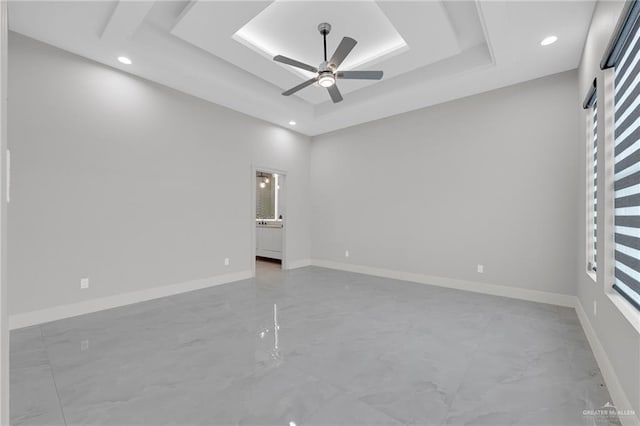 3005 N Alyna Ave, Edinburg, TX 78541 - spare room with a tray ceiling, a ceiling fan, recessed lighting, and baseboards