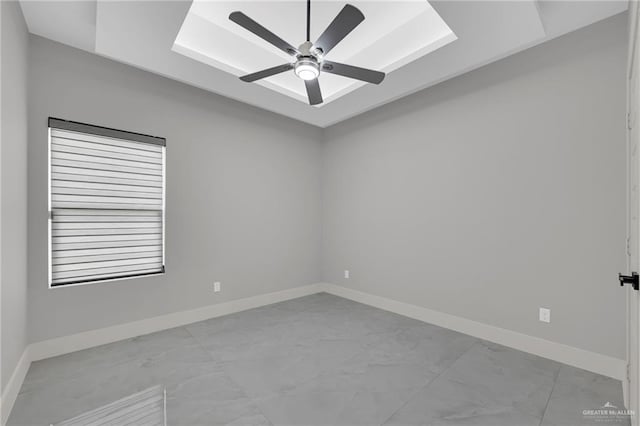3005 N Alyna Ave, Edinburg, TX 78541 - spare room with light marble finish flooring, baseboards, and ceiling fan