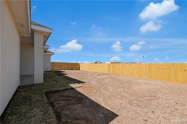 view of yard featuring a fenced backyard