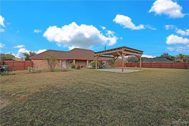 view of yard with a pergola and a patio area