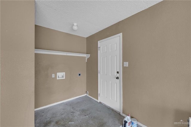 washroom featuring washer hookup, hookup for an electric dryer, and a textured ceiling