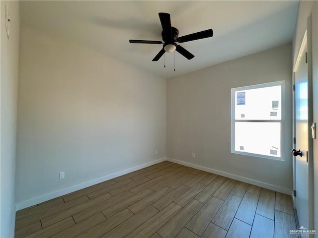 empty room featuring ceiling fan