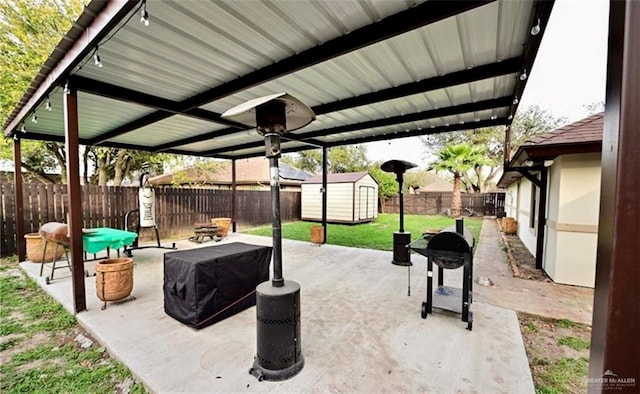 view of patio with a storage unit