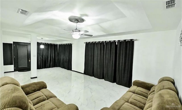 living room featuring ceiling fan