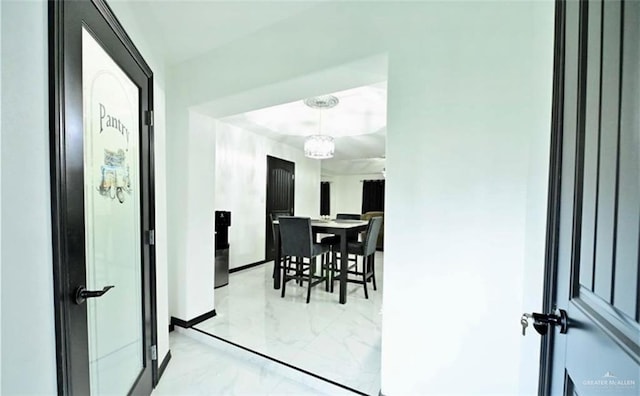 dining room with a chandelier