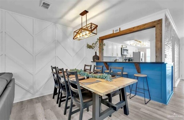 dining area featuring light hardwood / wood-style flooring