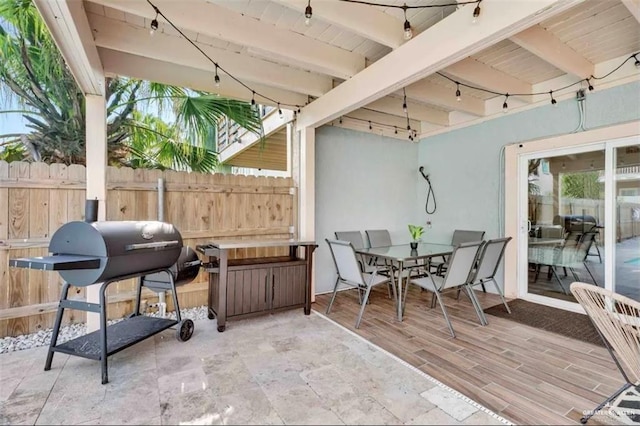 view of patio / terrace with a grill and a deck