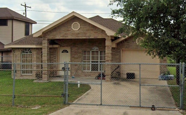 view of front of home with a garage and a front yard