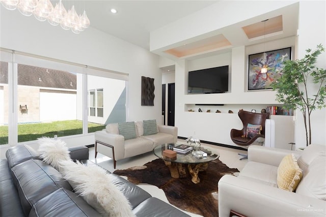 living room featuring a chandelier