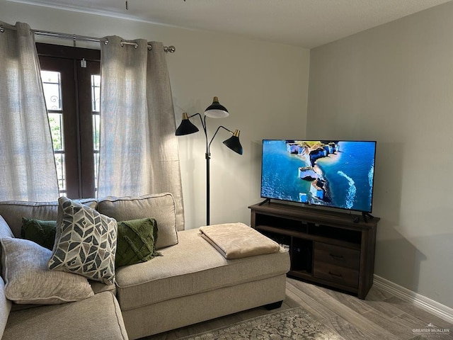 living area with light hardwood / wood-style floors