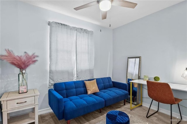 interior space featuring hardwood / wood-style floors and ceiling fan