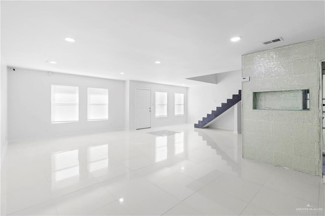 interior space featuring light tile patterned floors