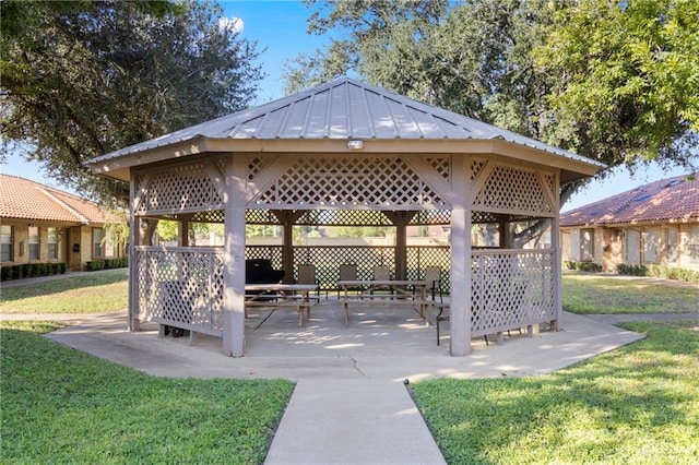 view of home's community featuring a gazebo, a yard, and a patio