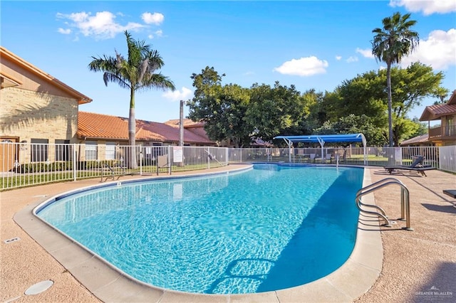 view of pool featuring a patio