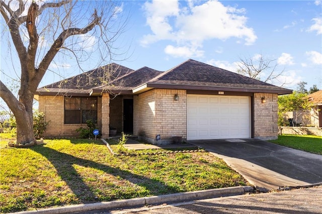 ranch-style home with a front yard, brick siding, driveway, and an attached garage