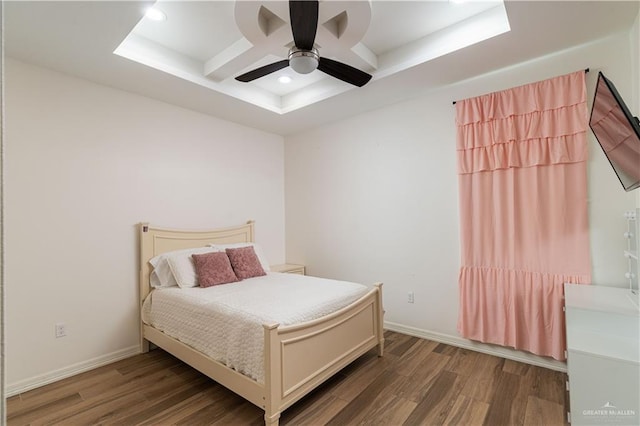 bedroom with beam ceiling, hardwood / wood-style flooring, ceiling fan, and coffered ceiling