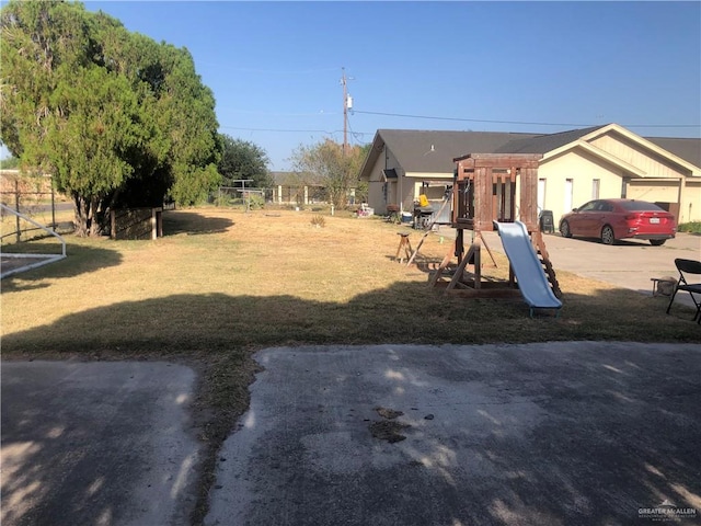 view of yard with a playground