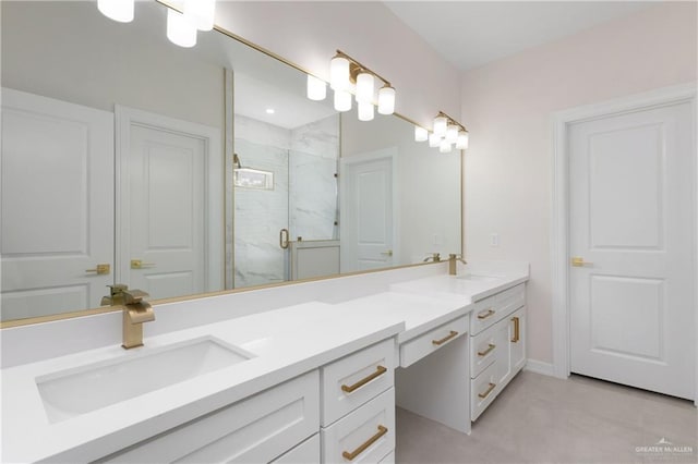 bathroom featuring double vanity, a shower stall, and a sink